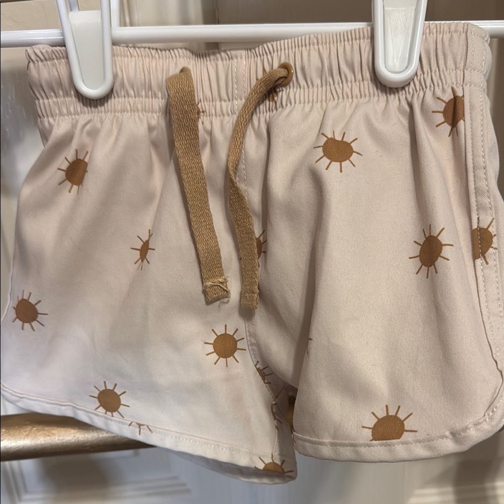Rylee + Cru Cream and Brown Sun Pattern Kids Swim Trunks
